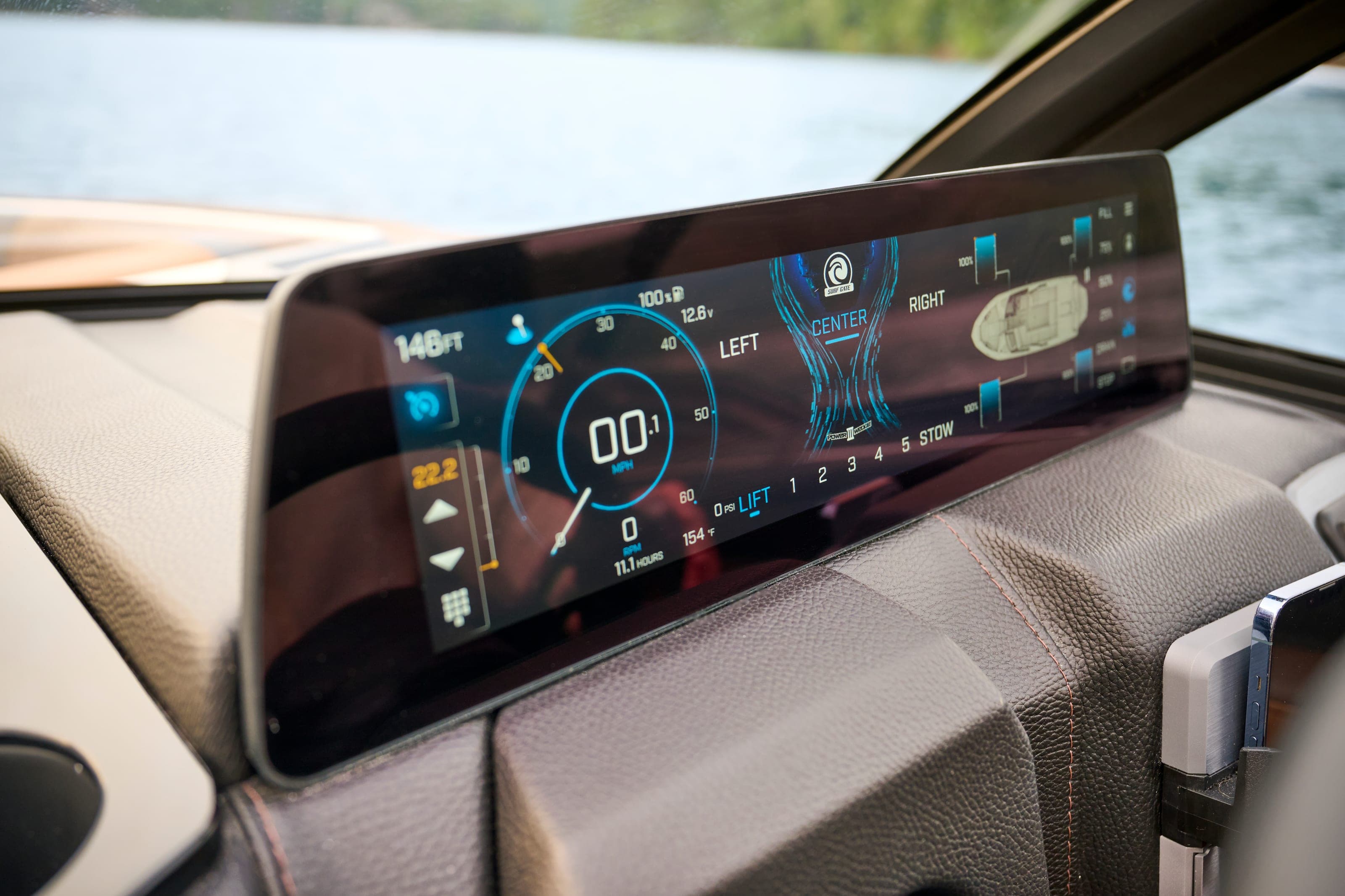 The dashboard screens of a Malibu 23 LSV