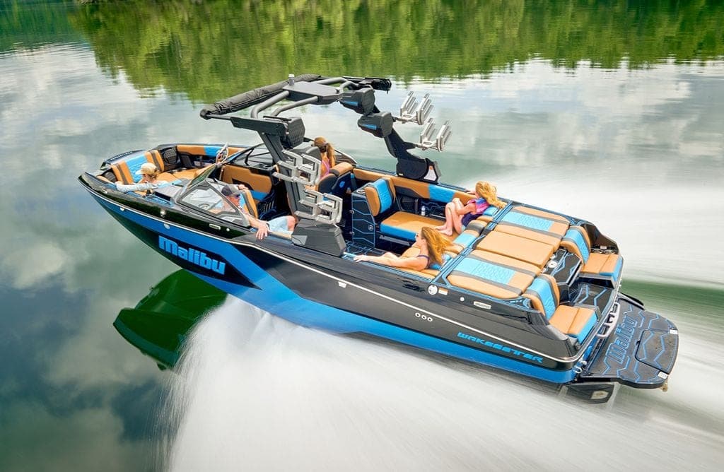 A Malibu 24 MXZ from above, crew aboard