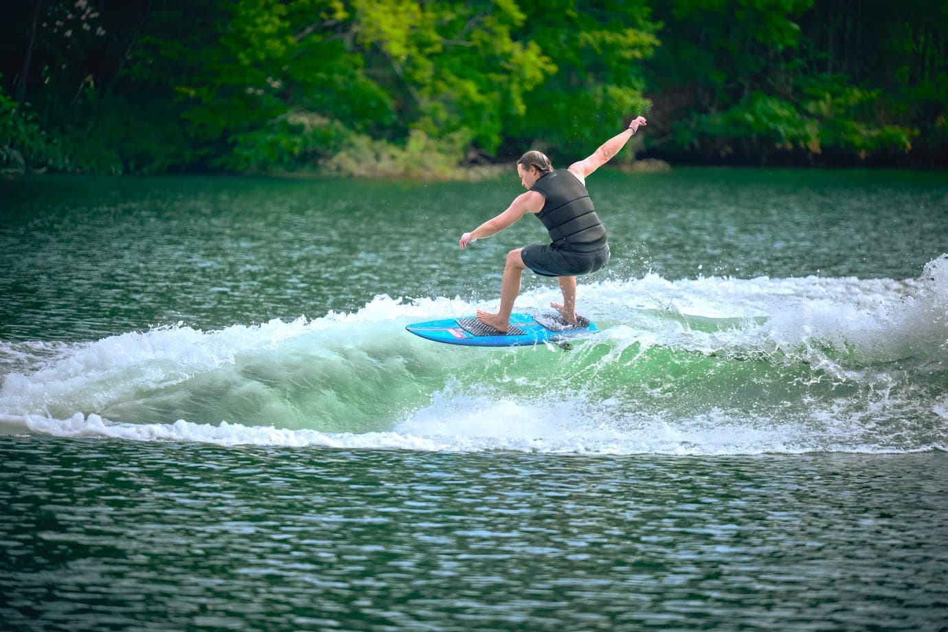A surfer on the wave of an Axis A200