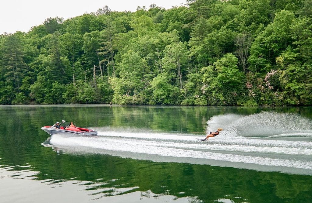A slalom skier behind a Malibu Response TXi